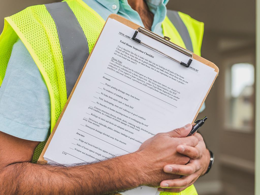 Which buildings in Singapore must undergo periodic facade inspection?
